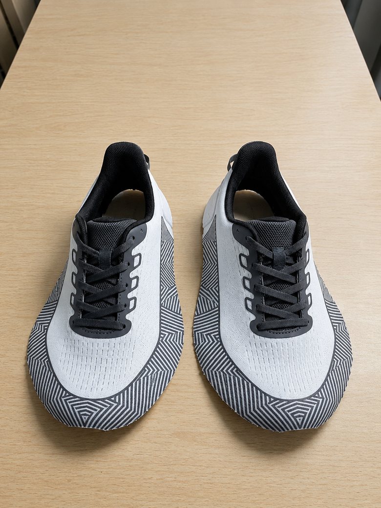 Grey and white knit upper with black trim