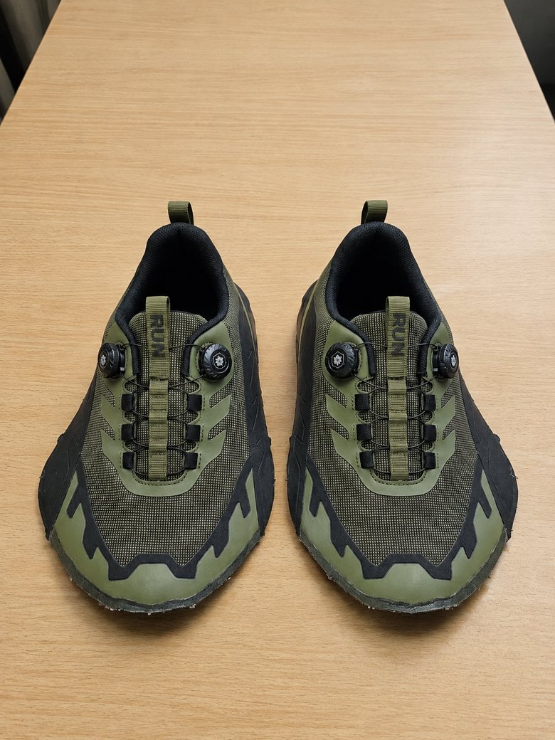 Olive green knit upper with black overlays and toggle lacing