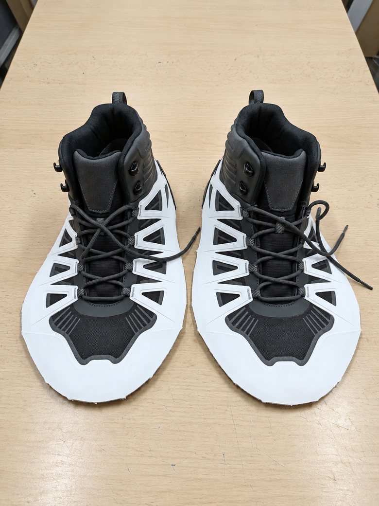 White upper with black cage overlays