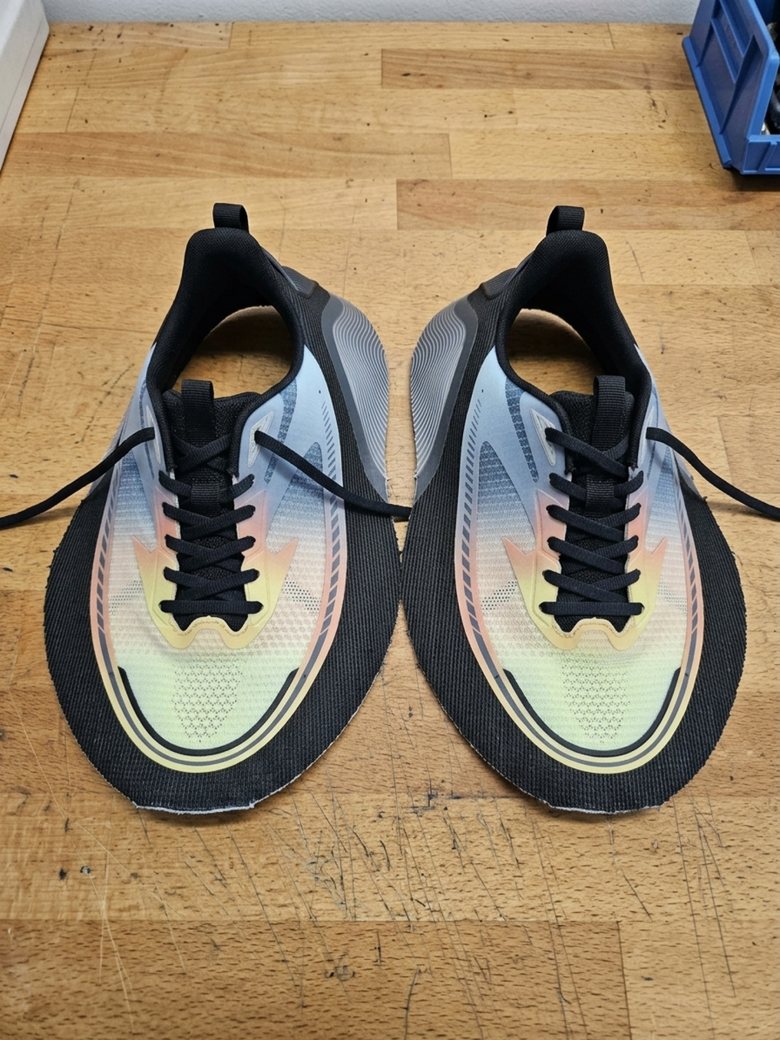 Iridescent gradient knit upper with black trim